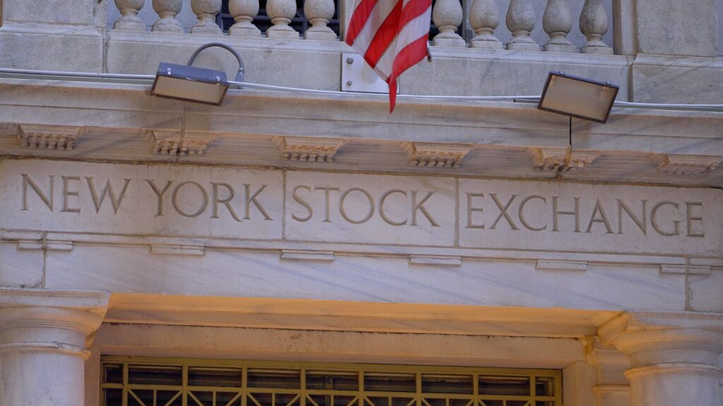 Stocks Settle Lower as Crude Oil Prices Jump